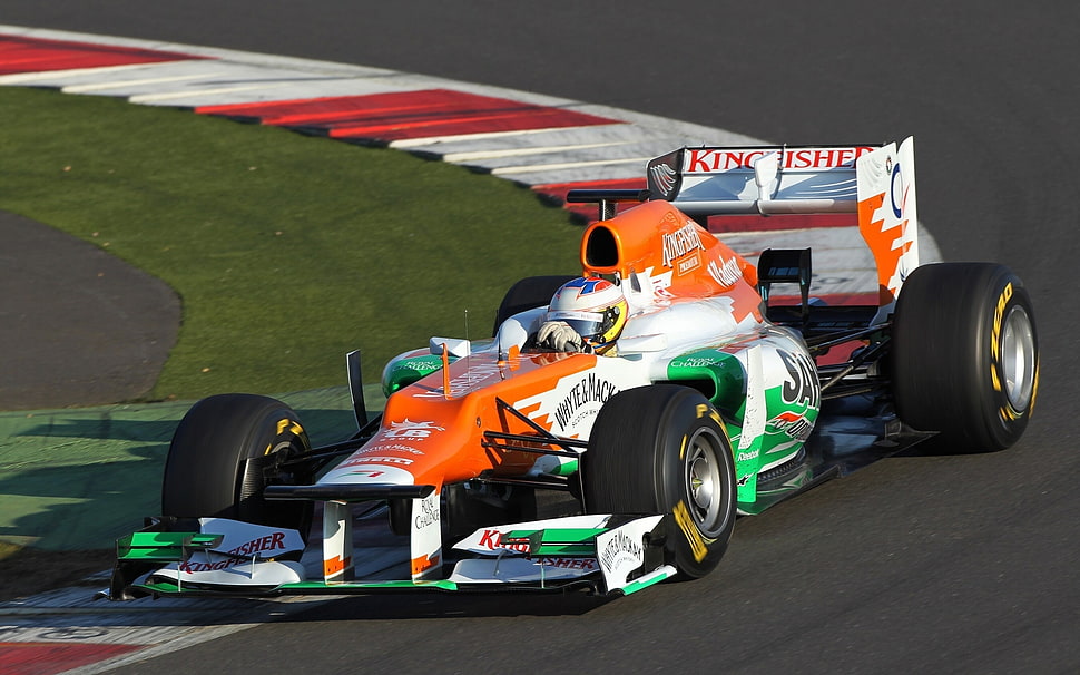 person riding F1 car HD wallpaper
